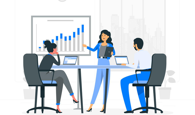 3 Leute bei einem Meeting